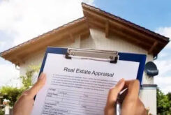 person filling real estate appraisal